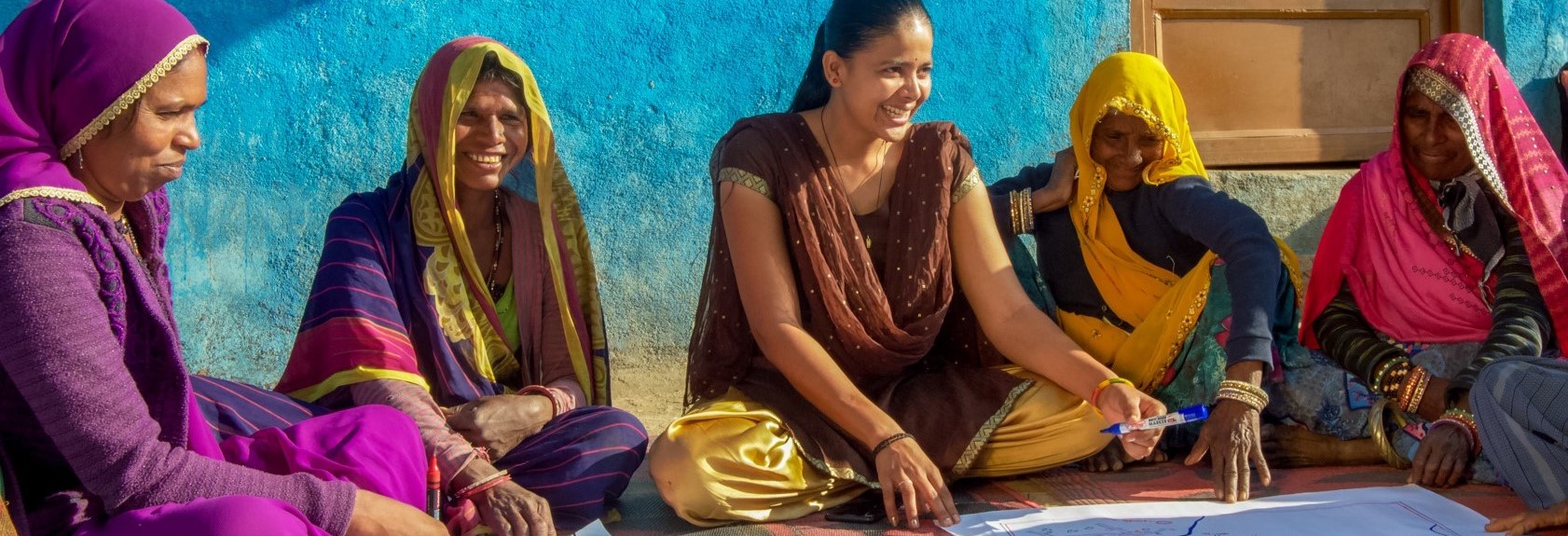 Women from the Dharampuri village in Madhya Pradesh, India map out plans for community management of water in their village. An integral component of the USAID Gap Inc. Women + Water Alliance is facilitating village action water planning where community members outline plans to improve their village’s water security, water quality, and water governance. To date, the alliance has developed 1,101 Village Action Plans (VAPs) with active community participation through alliance partner, WaterAid.